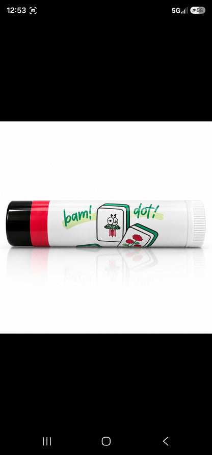 Bam! Dot! Mahjong Lip Balm with colorful green and red mahjong-inspired tile designs.